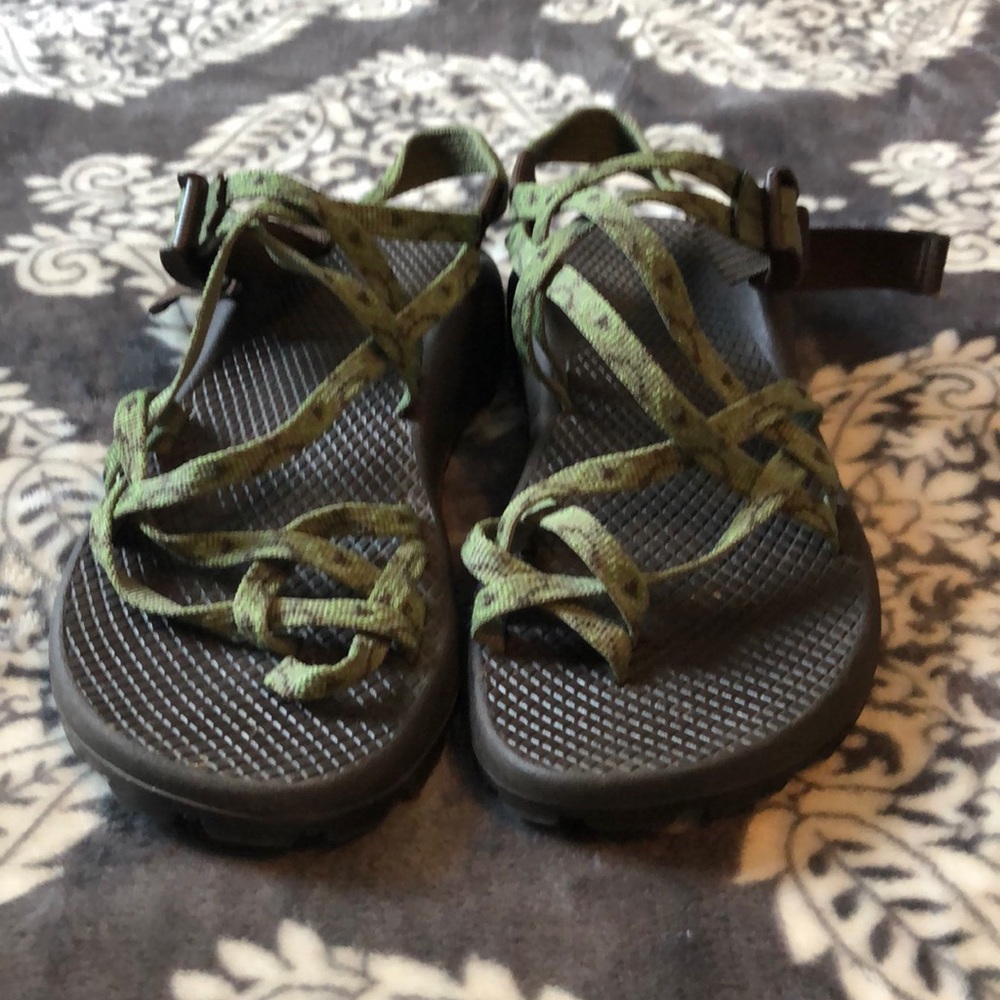 Brown and green Chacos